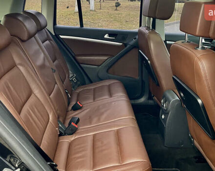 Чорний Фольксваген Тігуан, об'ємом двигуна 2 л та пробігом 223 тис. км за 16950 $, фото 42 на Automoto.ua