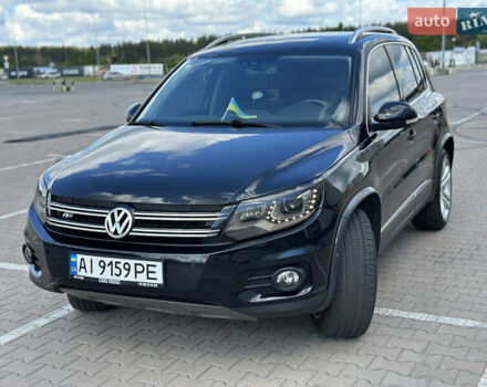 Чорний Фольксваген Тігуан, об'ємом двигуна 1.98 л та пробігом 180 тис. км за 14600 $, фото 1 на Automoto.ua