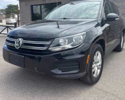 Черный Фольксваген Тигуан, объемом двигателя 2 л и пробегом 77 тыс. км за 3400 $, фото 1 на Automoto.ua