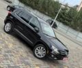 Чорний Фольксваген Тігуан, об'ємом двигуна 2 л та пробігом 157 тис. км за 13499 $, фото 12 на Automoto.ua