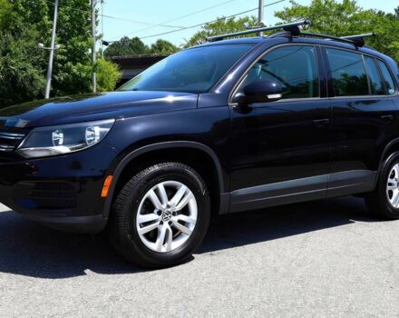 Черный Фольксваген Тигуан, объемом двигателя 2 л и пробегом 77 тыс. км за 5600 $, фото 1 на Automoto.ua