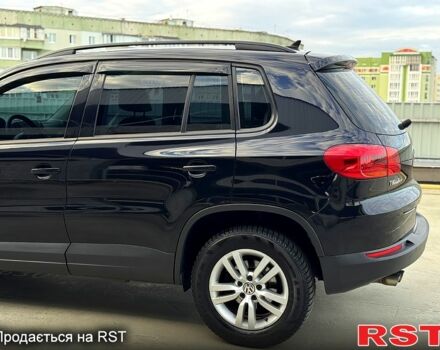Чорний Фольксваген Тігуан, об'ємом двигуна 2 л та пробігом 184 тис. км за 12450 $, фото 2 на Automoto.ua