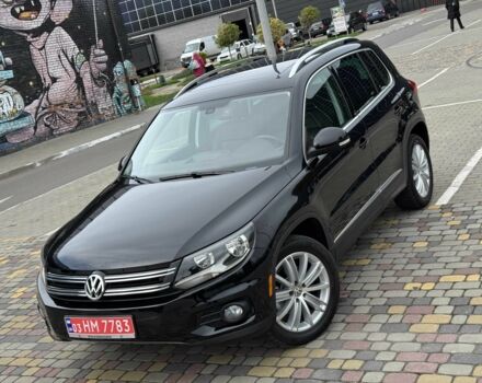 Чорний Фольксваген Тігуан, об'ємом двигуна 2 л та пробігом 157 тис. км за 13499 $, фото 1 на Automoto.ua