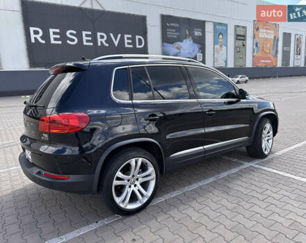 Чорний Фольксваген Тігуан, об'ємом двигуна 1.98 л та пробігом 180 тис. км за 14600 $, фото 2 на Automoto.ua