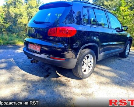 Черный Фольксваген Тигуан, объемом двигателя 2 л и пробегом 182 тыс. км за 14000 $, фото 1 на Automoto.ua