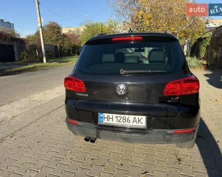 Черный Фольксваген Тигуан, объемом двигателя 1.98 л и пробегом 150 тыс. км за 15000 $, фото 1 на Automoto.ua