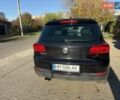 Черный Фольксваген Тигуан, объемом двигателя 1.98 л и пробегом 150 тыс. км за 15000 $, фото 1 на Automoto.ua