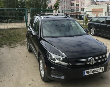 Черный Фольксваген Тигуан, объемом двигателя 2 л и пробегом 131 тыс. км за 14000 $, фото 1 на Automoto.ua