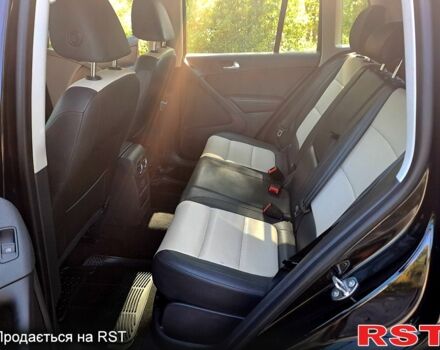 Черный Фольксваген Тигуан, объемом двигателя 2 л и пробегом 182 тыс. км за 14000 $, фото 5 на Automoto.ua