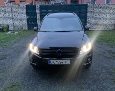 Черный Фольксваген Тигуан, объемом двигателя 2 л и пробегом 148 тыс. км за 13500 $, фото 1 на Automoto.ua