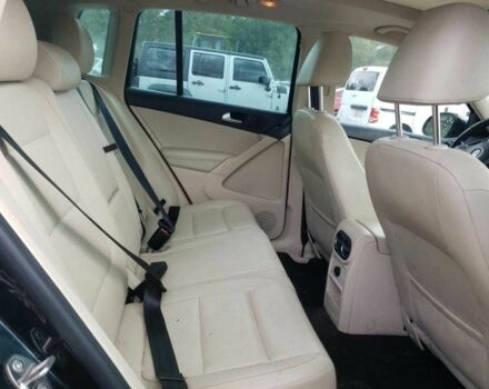 Чорний Фольксваген Тігуан, об'ємом двигуна 2 л та пробігом 64 тис. км за 1200 $, фото 10 на Automoto.ua