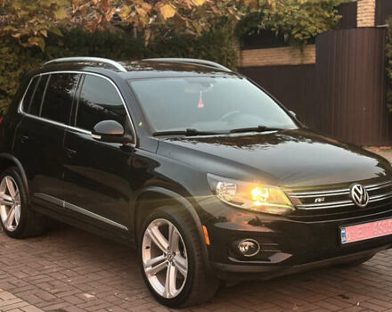 Чорний Фольксваген Тігуан, об'ємом двигуна 2 л та пробігом 207 тис. км за 14200 $, фото 1 на Automoto.ua