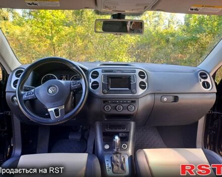 Черный Фольксваген Тигуан, объемом двигателя 2 л и пробегом 182 тыс. км за 14000 $, фото 4 на Automoto.ua