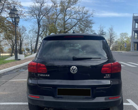 Чорний Фольксваген Тігуан, об'ємом двигуна 2 л та пробігом 180 тис. км за 14700 $, фото 5 на Automoto.ua
