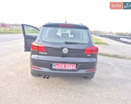 Чорний Фольксваген Тігуан, об'ємом двигуна 2 л та пробігом 135 тис. км за 13850 $, фото 2 на Automoto.ua