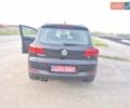 Чорний Фольксваген Тігуан, об'ємом двигуна 2 л та пробігом 135 тис. км за 13850 $, фото 2 на Automoto.ua