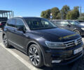 Чорний Фольксваген Тігуан, об'ємом двигуна 1.4 л та пробігом 283 тис. км за 19300 $, фото 2 на Automoto.ua