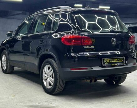 Чорний Фольксваген Тігуан, об'ємом двигуна 2 л та пробігом 133 тис. км за 14400 $, фото 3 на Automoto.ua