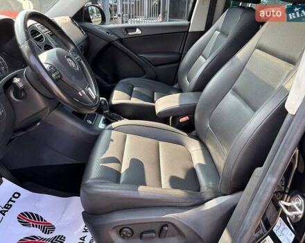 Чорний Фольксваген Тігуан, об'ємом двигуна 1.98 л та пробігом 180 тис. км за 14500 $, фото 2 на Automoto.ua