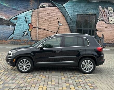 Чорний Фольксваген Тігуан, об'ємом двигуна 2 л та пробігом 157 тис. км за 13499 $, фото 4 на Automoto.ua