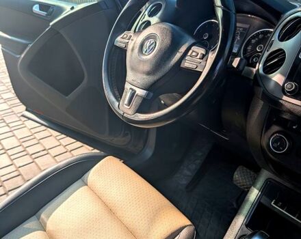 Чорний Фольксваген Тігуан, об'ємом двигуна 2 л та пробігом 139 тис. км за 13200 $, фото 5 на Automoto.ua