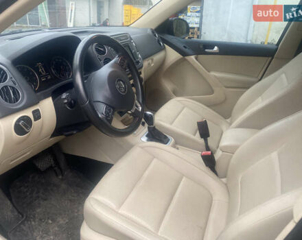 Черный Фольксваген Тигуан, объемом двигателя 1.98 л и пробегом 130 тыс. км за 12499 $, фото 2 на Automoto.ua