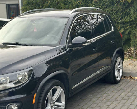 Чорний Фольксваген Тігуан, об'ємом двигуна 2 л та пробігом 207 тис. км за 14200 $, фото 4 на Automoto.ua