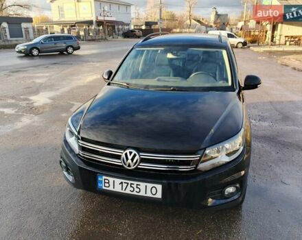 Черный Фольксваген Тигуан, объемом двигателя 1.98 л и пробегом 83 тыс. км за 12800 $, фото 1 на Automoto.ua