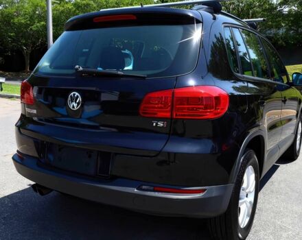 Черный Фольксваген Тигуан, объемом двигателя 2 л и пробегом 77 тыс. км за 5600 $, фото 2 на Automoto.ua