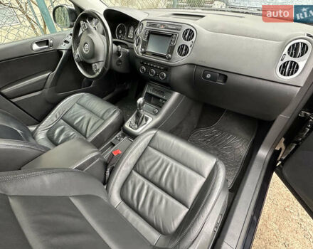 Чорний Фольксваген Тігуан, об'ємом двигуна 1.98 л та пробігом 160 тис. км за 13950 $, фото 87 на Automoto.ua