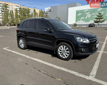Черный Фольксваген Тигуан, объемом двигателя 1.4 л и пробегом 123 тыс. км за 15800 $, фото 1 на Automoto.ua