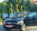 Чорний Фольксваген Тігуан, об'ємом двигуна 1.98 л та пробігом 105 тис. км за 12999 $, фото 1 на Automoto.ua