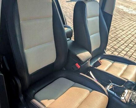 Чорний Фольксваген Тігуан, об'ємом двигуна 2 л та пробігом 139 тис. км за 13200 $, фото 6 на Automoto.ua