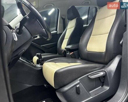 Черный Фольксваген Тигуан, объемом двигателя 2 л и пробегом 133 тыс. км за 14400 $, фото 7 на Automoto.ua