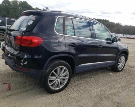 Чорний Фольксваген Тігуан, об'ємом двигуна 2 л та пробігом 64 тис. км за 1200 $, фото 2 на Automoto.ua