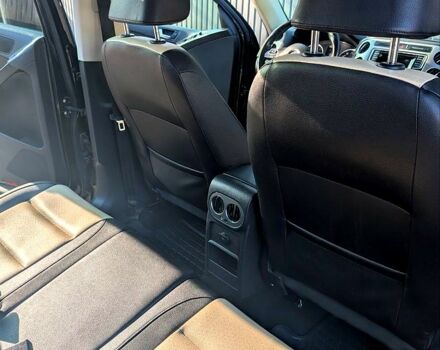 Чорний Фольксваген Тігуан, об'ємом двигуна 2 л та пробігом 139 тис. км за 13200 $, фото 4 на Automoto.ua