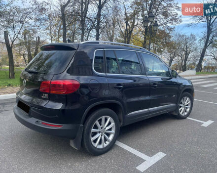 Чорний Фольксваген Тігуан, об'ємом двигуна 2 л та пробігом 180 тис. км за 14700 $, фото 2 на Automoto.ua