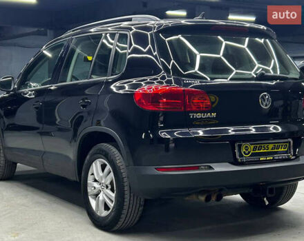 Черный Фольксваген Тигуан, объемом двигателя 2 л и пробегом 133 тыс. км за 14400 $, фото 3 на Automoto.ua