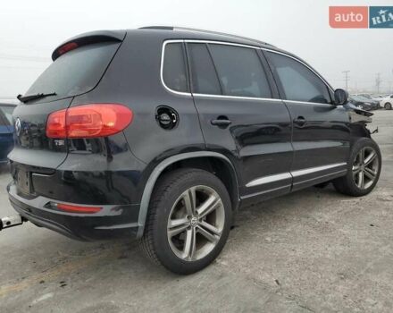 Черный Фольксваген Тигуан, объемом двигателя 1.98 л и пробегом 65 тыс. км за 650 $, фото 2 на Automoto.ua