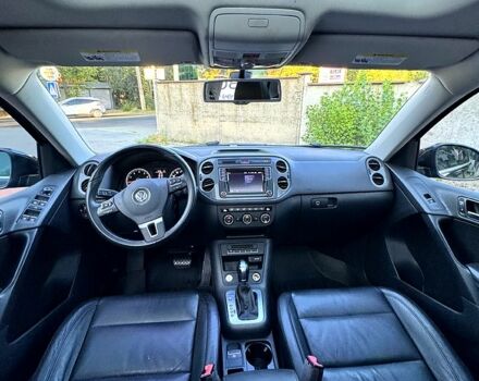 Черный Фольксваген Тигуан, объемом двигателя 2 л и пробегом 124 тыс. км за 16000 $, фото 2 на Automoto.ua