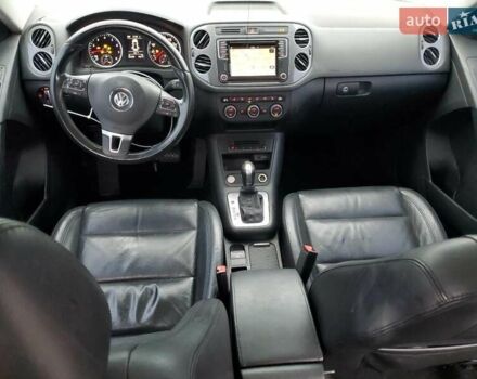 Черный Фольксваген Тигуан, объемом двигателя 1.98 л и пробегом 65 тыс. км за 650 $, фото 7 на Automoto.ua