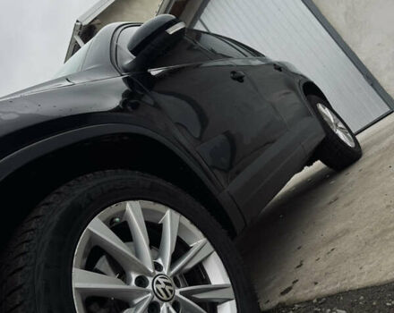 Чорний Фольксваген Тігуан, об'ємом двигуна 1.98 л та пробігом 210 тис. км за 11400 $, фото 2 на Automoto.ua