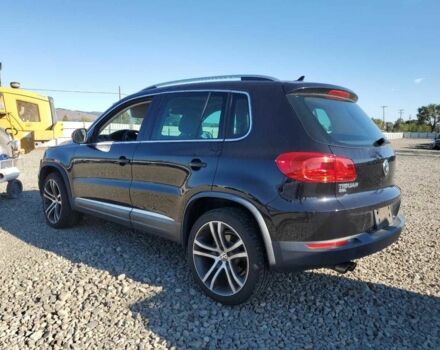 Черный Фольксваген Тигуан, объемом двигателя 2 л и пробегом 80 тыс. км за 2000 $, фото 1 на Automoto.ua