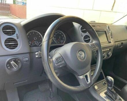 Чорний Фольксваген Тігуан, об'ємом двигуна 2 л та пробігом 153 тис. км за 12000 $, фото 5 на Automoto.ua