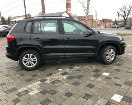 Чорний Фольксваген Тігуан, об'ємом двигуна 2 л та пробігом 187 тис. км за 10900 $, фото 2 на Automoto.ua