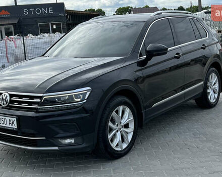 Черный Фольксваген Тигуан, объемом двигателя 1.97 л и пробегом 250 тыс. км за 23500 $, фото 2 на Automoto.ua