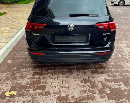 Чорний Фольксваген Тігуан, об'ємом двигуна 2 л та пробігом 167 тис. км за 25500 $, фото 2 на Automoto.ua