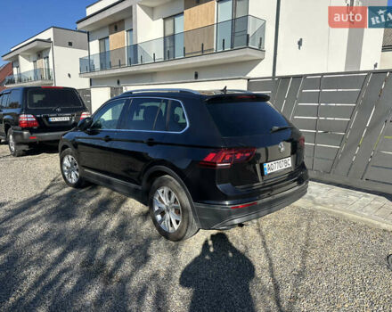 Черный Фольксваген Тигуан, объемом двигателя 1.97 л и пробегом 235 тыс. км за 21000 $, фото 2 на Automoto.ua