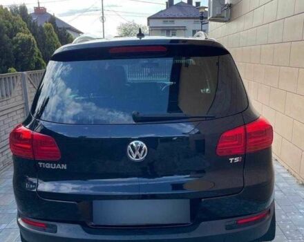 Чорний Фольксваген Тігуан, об'ємом двигуна 2 л та пробігом 153 тис. км за 12000 $, фото 4 на Automoto.ua