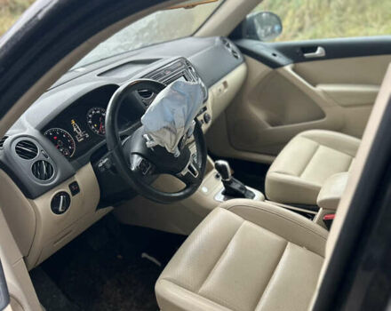 Черный Фольксваген Тигуан, объемом двигателя 1.98 л и пробегом 198 тыс. км за 8800 $, фото 7 на Automoto.ua